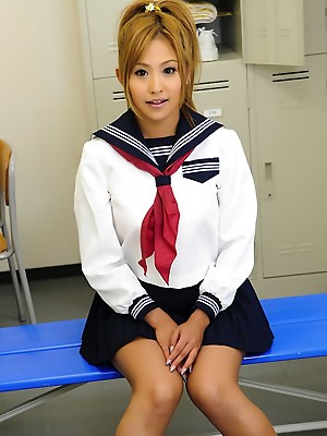 Japanese blonde poses in her school uniform